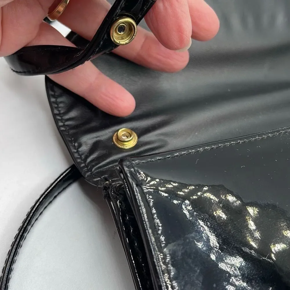 Vintage faux leather crossbody envelope clutch bag.